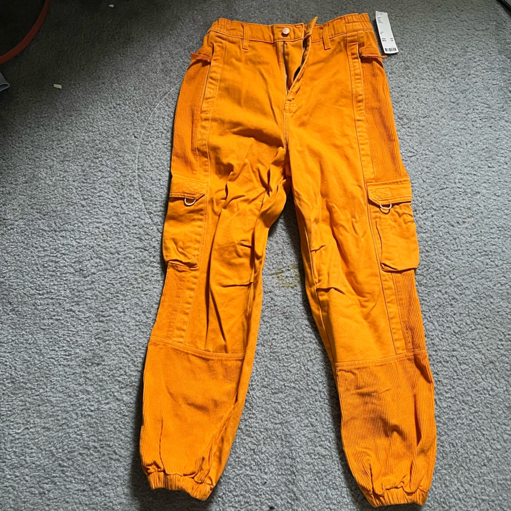 Orange urban outfitters cargo pants NWT size Medium